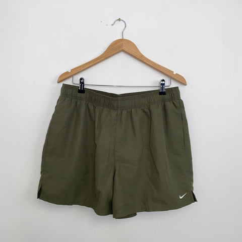 Preowned Nike Athletic Woven Shorts Womens Size XL Khaki Green Swoosh Logo Pockets.